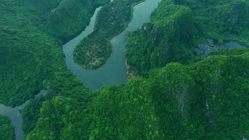 Mountains, green forest and drone for ecology, lake and hills with trees, landscape and scenery. Outdoor, nature and ecosystem in asia, peaceful and environment for sustainability and eco friendly