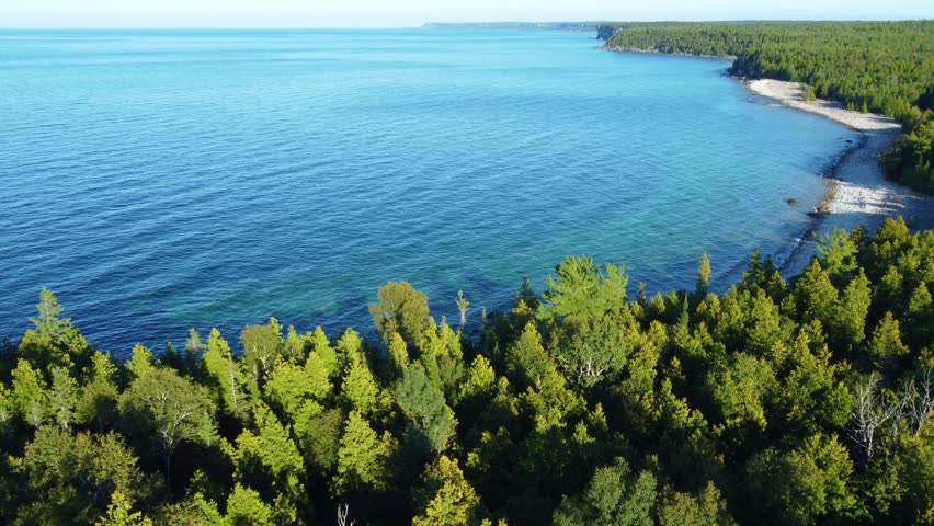 Turquoise Beach And Dense Forest In Georgian Bay, Bruce Peninsula, Ontario, Canada. Aerial Shot