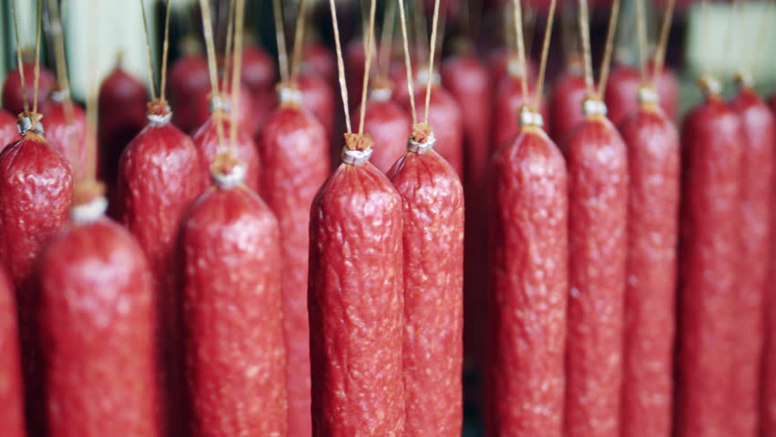 Raw-smoked sausages preserved in the meat factory | Shutterstock HD Video #1111701879
