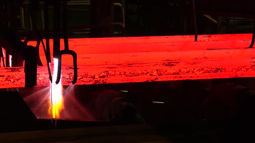 Iron foundry. Continuous casting machine. Production of steel billets. Continuous casting machine with blow torch working.  hot steel on conveyor in steel mill. Steel Billets at Torch Cutting
 | Shutterstock HD Video #1111726499