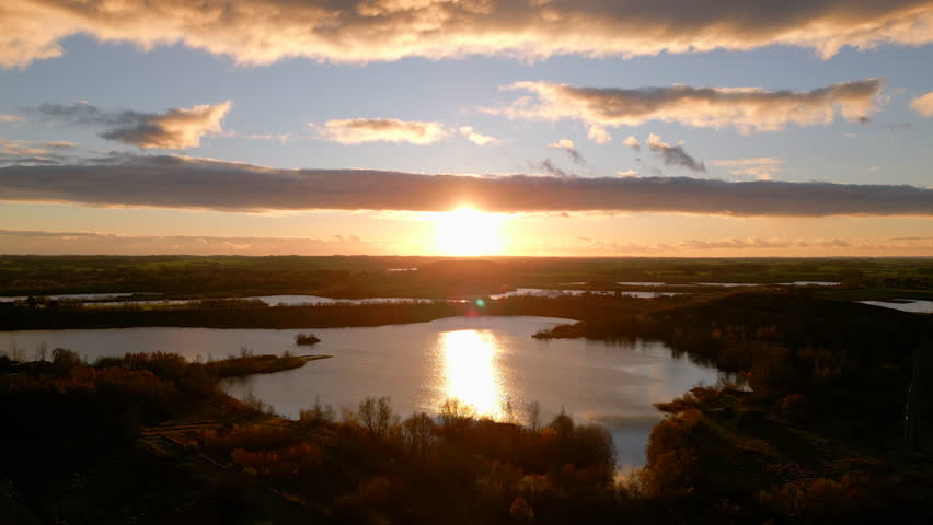 Aerial view of autumn sunset over lake