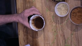 Barista hands preparing a coffee.Vertical Video