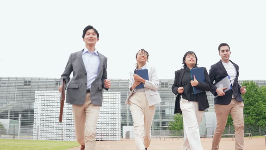 Group of multinational people running on street. International business. | Shutterstock HD Video #1111734637