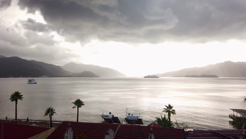 Moody Marmaris: Rainy Clouds, Coastal Beauty, and Palm Trees - Cinematic Experience Royalty-Free Stock Footage #1111738753