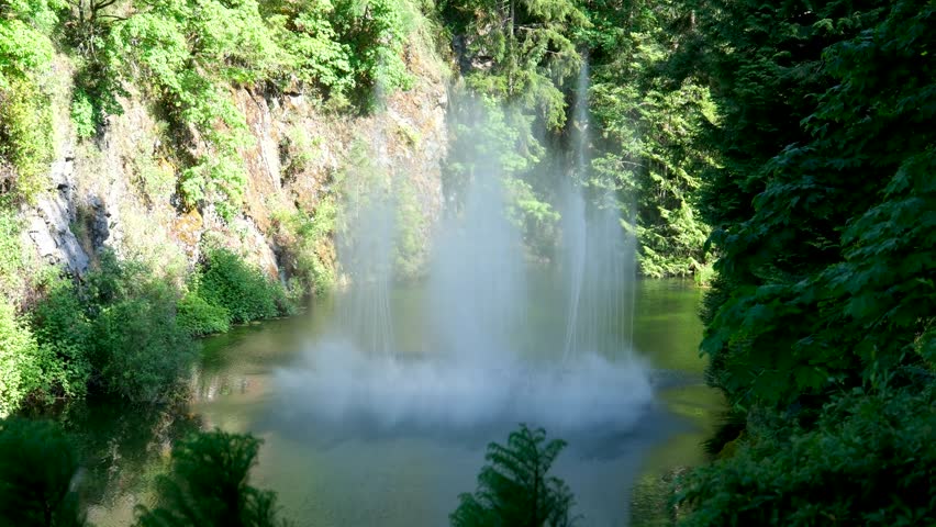 Fountains on a lake in Canada on the island of Victoria. The famous gardens of Butchert on Victoria Island. Canada. The Butchart Gardens