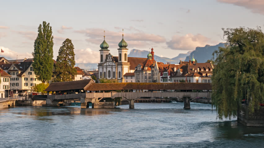 Hyper lapse panorama Lucerne old town, Spreuer Bridge (Spreuerbrucke) and Jesuit Church (Jesuitenkirche) , Switzerland.