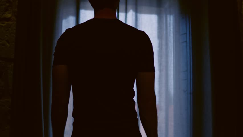 Man back view open curtains in the morning in the hotel home room with solid moves and looking around from the window to outside weather | Shutterstock HD Video #1111755969