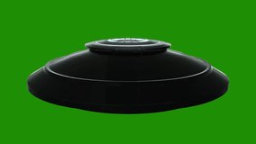 Flying UFO on green background Loop video