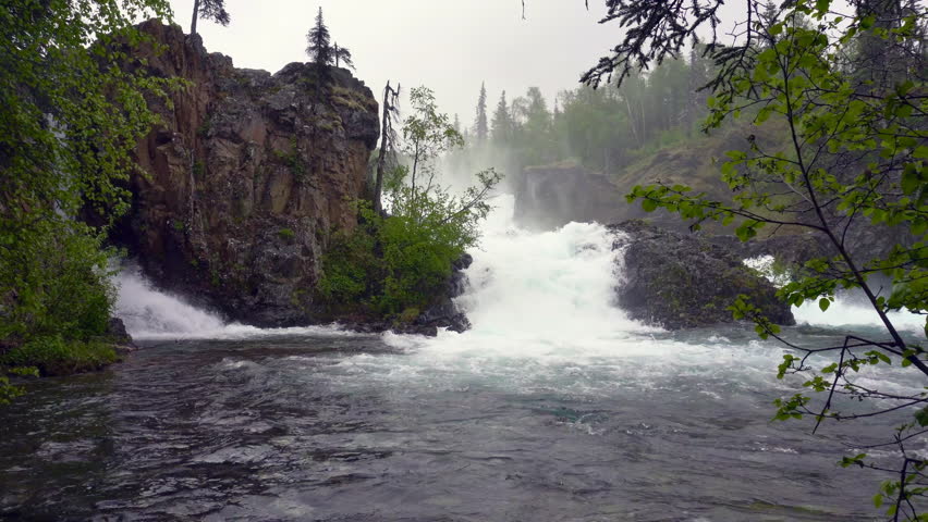 Lake Clark National Park in Alaska. Tanalian Falls and river. Spruce trees, rugged mountains and popular day hike area near Port Alsworth.