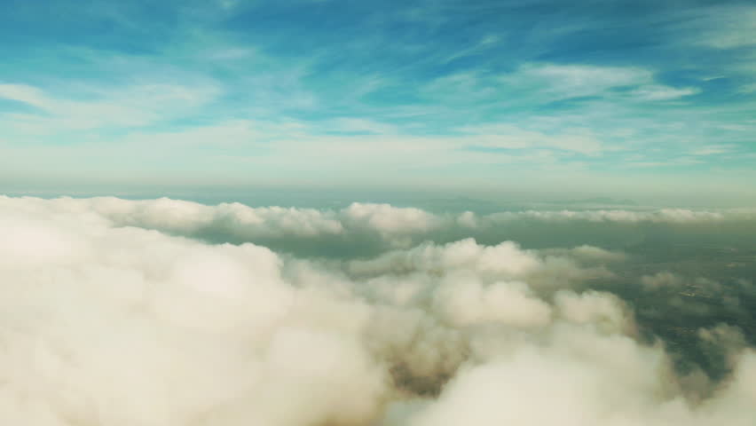 Drone, blue sky and clouds of nature, heaven or new dawn in mysterious, beautiful and natural land. Serene, calm aerial view of peaceful cloudy mist and magical or natural scenery of earth weather. | Shutterstock HD Video #1111766975
