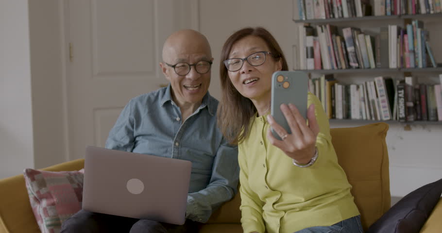 Senior Adult Couple at Home using Technology | Shutterstock HD Video #1111773939