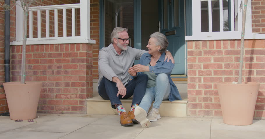 Portrait of Senior Adult Couple Outside Home | Shutterstock HD Video #1111773957