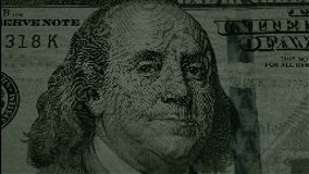 Macro video of one hundred US dollars. $100 cash with glitch effects and TV interference. Stop traffic. Close-up for a hundred dollars. Stop motion texture of 100 dollar bills. Concept of business fin
