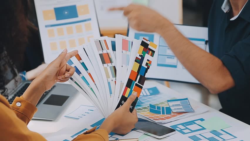 Team of Creative Web Graphic Designer planning, drawing website ux app for mobile phone application and development template layout, process to developing prototype wireframe, User experience concept. | Shutterstock HD Video #1111779341