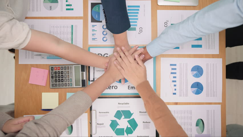 Save the earth planet climate change social ESG office net zero waste unity stack hand fist bump circle trust go green team huddle. Group SDGs goals people CO2 credit carbon offset control support | Shutterstock HD Video #1111783083