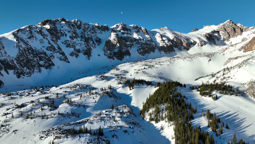 Aerial shot of the snow covered Rocky Mountains in Colorado.