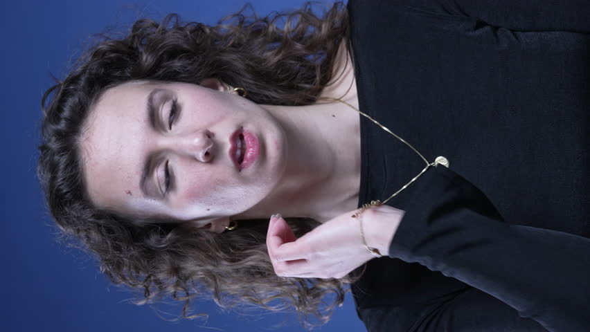Stressed young woman struggles with neck pain rubbing body feeling anxiety in vertical video | Shutterstock HD Video #1111789739