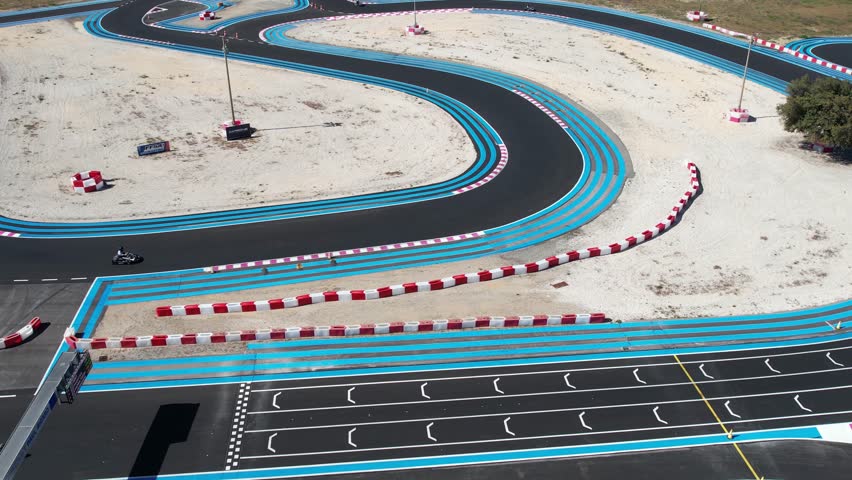 Aerial Shot of Ongoing Go Kart Race on Motor Racing Tracks | Shutterstock HD Video #1111792983