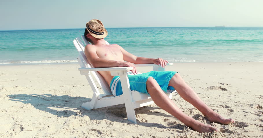 Man Relaxing On Deck Chair Stock Footage Video 100 Royalty Free 11117975 Shutterstock