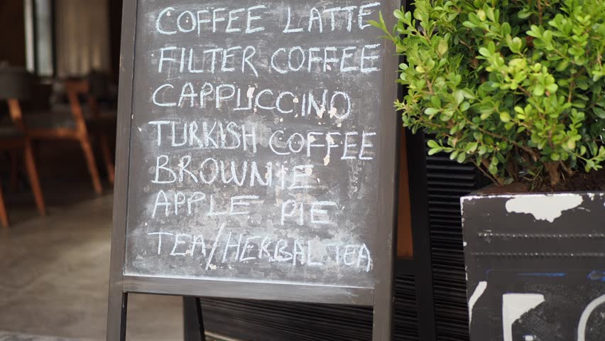 Cafe menu on black board outdoor 
