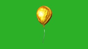 Footage of twinkling gold balloons floating, with a green screen background.