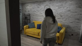 Full picture of mom and son, come to the sofa, sit down and start reading a book - Powered by Shutterstock - Get 15% off with code: PIKWIZARD15