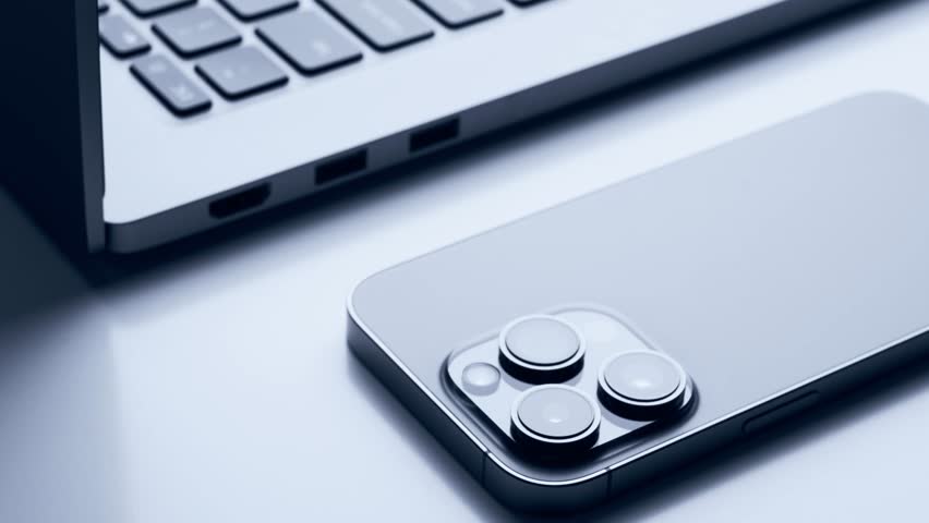 Close up of laptop and smartphone