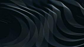 A black and white animated background with swirling patterns