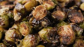 Oven roasted Brussel Sprouts with herbs and cheese. Rotating video - Powered by Shutterstock - Get 15% off with code: PIKWIZARD15