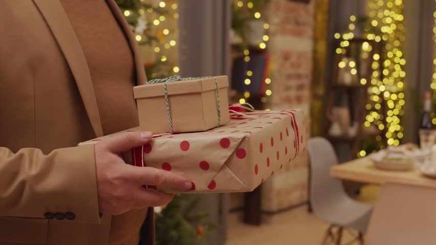 A woman gives another woman a gift | Shutterstock HD Video #1111822667