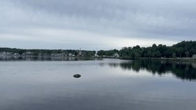 Looking across the calm water to the famous 3 churches along Mahone Bay.