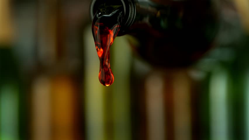Super Slow Motion of Pouring Red Wine With Camera Motion. Filmed on High Speed Cinema Camera, 1000 fps. Camera Follows the Stream into Glass. | Shutterstock HD Video #1111825745