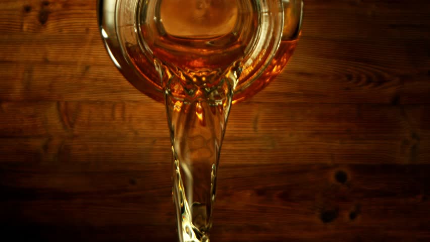 Super Slow Motion of Pouring Whiskey, Rum or Cognac Inside the Bottle. Lens is Moving Through the Bottle from Inside to Outside. Filmed on High Speed Cinema Camera, 1000fps. | Shutterstock HD Video #1111825839