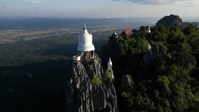 Drone video of Wat Chaloem Phra Kiat (The Temple of Floating Pagodas), Lampang Province, North Thailand. November 26th, 2023