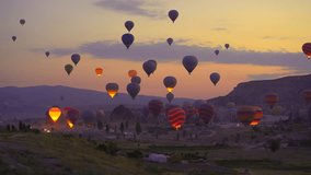 Captured against the canvas of the Cappadocian sky, this video showcases the enchanting spectacle of a hot air balloon festival. The vibrant balloons rise gracefully over the valleys of Cappadocia