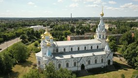 Aerial 4K video from drone to Daugavpils Orthodox Cathedral of the Holy Martyrs Boris and Gleb on a beautiful sunny summer day. Daugavpils, Latvia, Latgale, Europe
