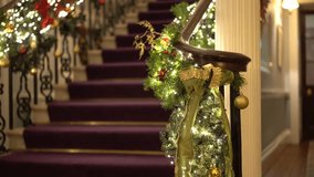 Beautiful staircase decorated with Christmas decorations and garlands 4k - Powered by Shutterstock - Get 15% off with code: PIKWIZARD15