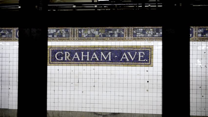 Graham ave sign Mosaic Subway Williamsburg New York Brooklyn 4k. Peering across the platform at the Graham Ave stop in Brooklyn.
