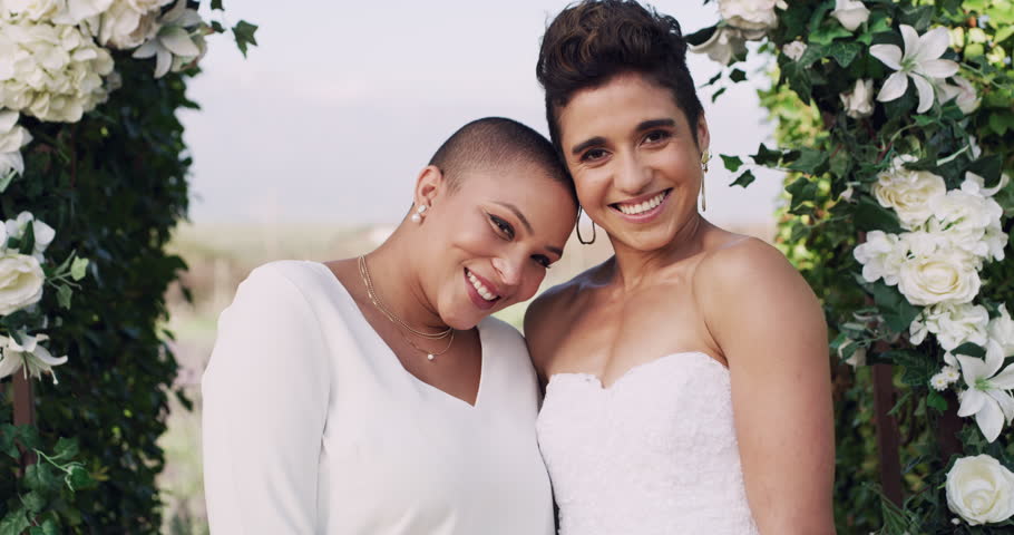 Wedding, lesbian or couple happy for ceremony, commitment or unity outdoor with laughing. Lgbtq, women or queer for marriage, celebration or bride with smile, love and flowers at event in nature | Shutterstock HD Video #1111840185
