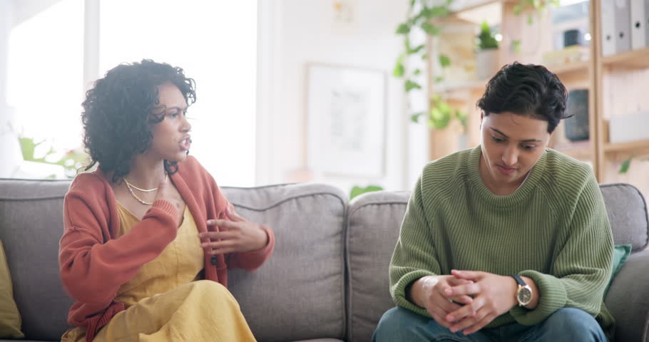 Home, lesbian, queer couple frustrated, fight and divorce with anger, screaming and cheating affair. Lgbtq people, women or disagreement with breakup, unhappy or upset with shouting or toxic behavior | Shutterstock HD Video #1111840427