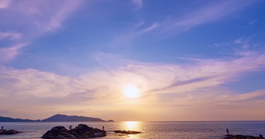 Beautiful 4K Time lapse of Majestic sunset or sunrise clouds sky over sea landscape,Amazing colorful light of nature cloudscape sunset sky background | Shutterstock HD Video #1111849795