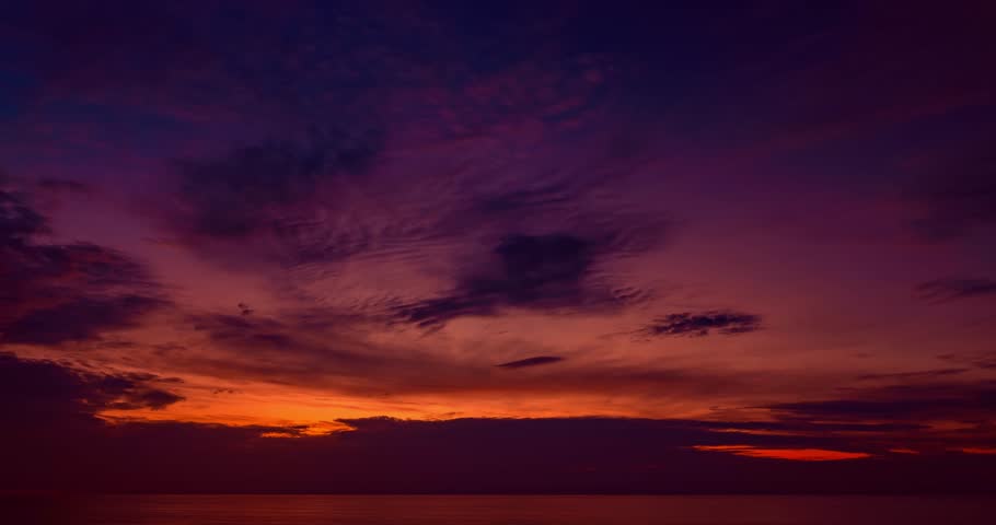 Beautiful 4K Time lapse of Majestic sunrise or sunset clouds sky over sea landscape,Amazing colorful light of nature cloudscape dramatic sky background | Shutterstock HD Video #1111849813