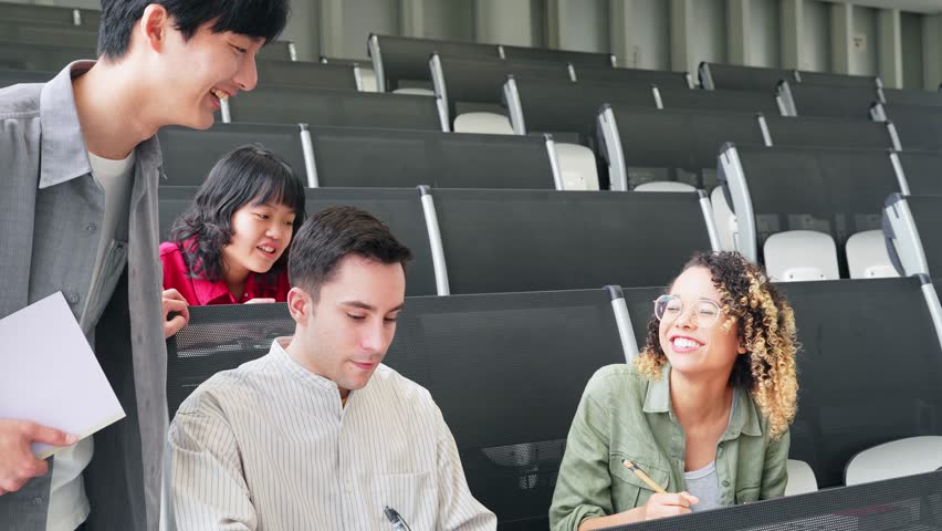 Group of multinational students having a conversation in a classroom. | Shutterstock HD Video #1111852035