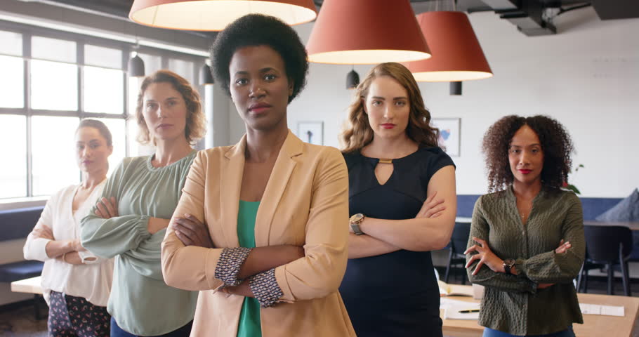 Portrait of confident diverse businesswomen standing in office with arms crossed, in slow motion. Business, teamwork, confidence and work. | Shutterstock HD Video #1111859825