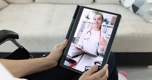 Disabled woman takes online medical consultation. Telemedicine for people with disabilities health concept