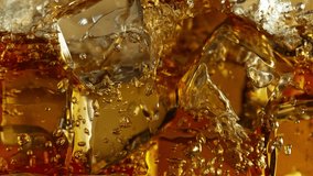 Super Slow Motion Detail Shot of Pouring Lemonade on Perfect Clear Ice Cubes at 1000fps. - Powered by Shutterstock - Get 15% off with code: PIKWIZARD15