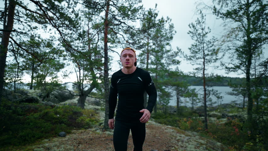 Athletic Sportsman Running And Training Alone In Mountains, Frontal Portrait In Motion From Drone | Shutterstock HD Video #1111868323