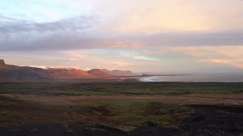 Stunning mountains during sunset in West Iceland. Handheld panning shot. | Shutterstock HD Video #1111877897