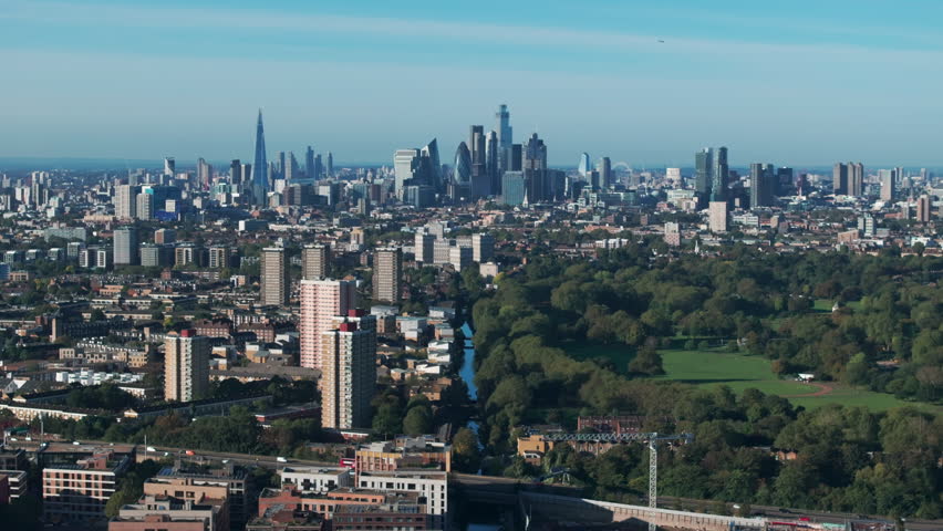 Descending aerial shot over Hertford union canal and victoria park towards central London Royalty-Free Stock Footage #1111881937