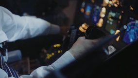 Airplane Pilot Holding Steering Wheel of Plane and Using Hand Controller to Fly. Cabin Technology and Control Panel in Aircraft Cockpit Close-Up. Professional Man Studying Flight as Aviator Closeup - Powered by Shutterstock - Get 15% off with code: PIKWIZARD15